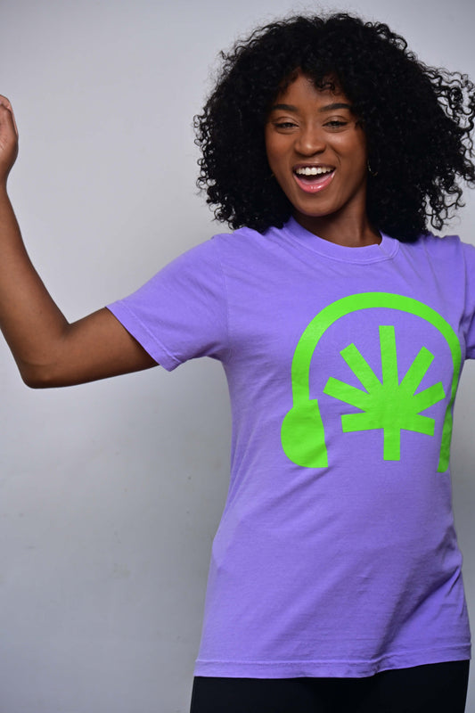 Violet tee with acid green Headphones front graphic featuring a stylized cannabis leaf (front, on-model)